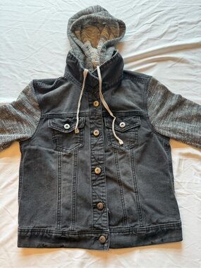 Mudd cream and black knit sweater label visible